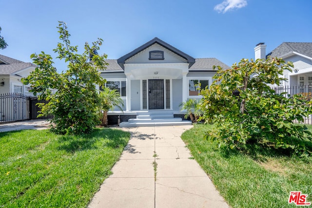 view of front of home with a front yard