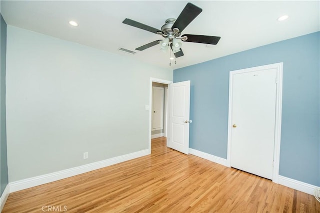 unfurnished bedroom with light wood-type flooring and ceiling fan