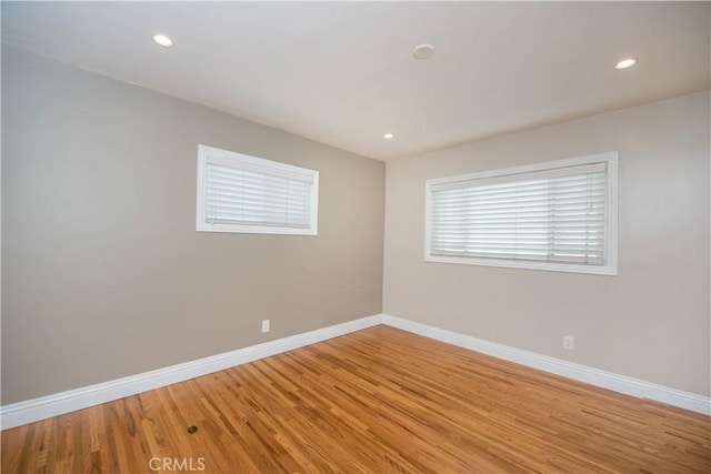 empty room featuring hardwood / wood-style flooring