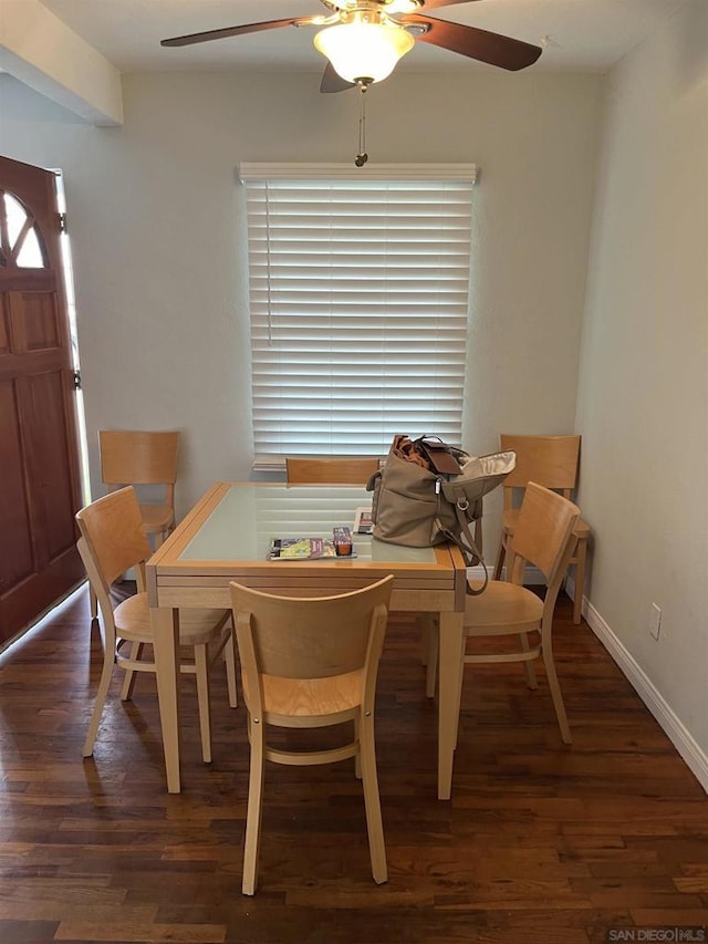 dining space featuring dark hardwood / wood-style flooring