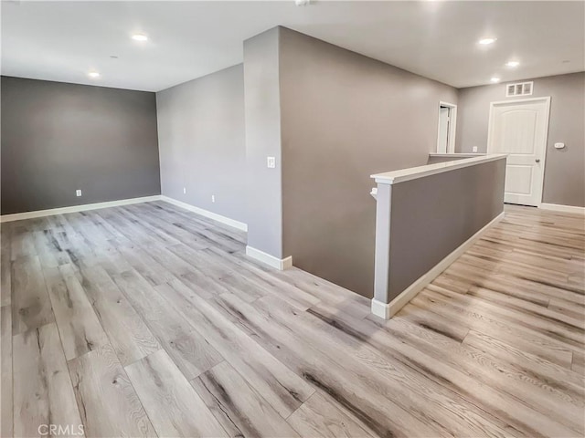 empty room featuring light hardwood / wood-style floors