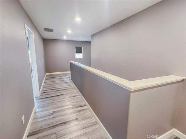 hall featuring light hardwood / wood-style floors