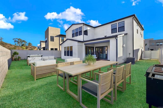 rear view of property featuring an outdoor hangout area, central AC, and a lawn