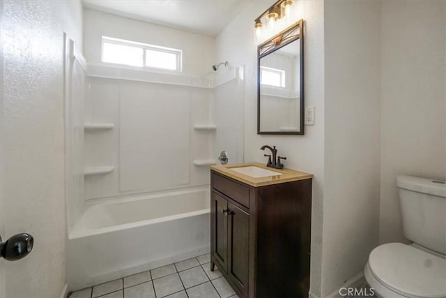 full bathroom with tile patterned floors, shower / tub combination, vanity, and toilet