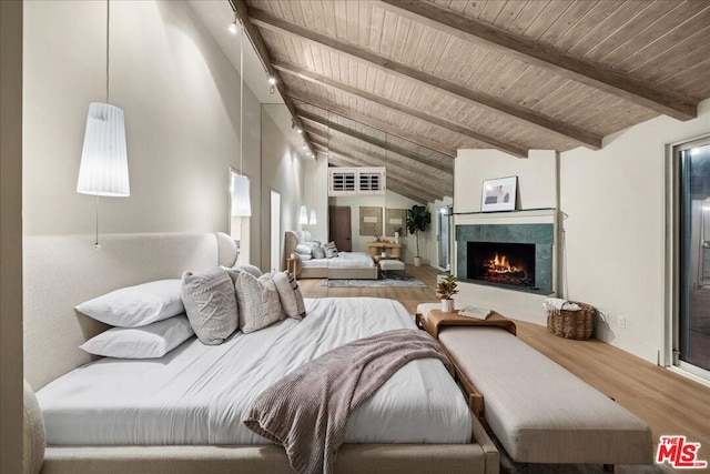 bedroom featuring wood ceiling, hardwood / wood-style floors, and lofted ceiling with beams