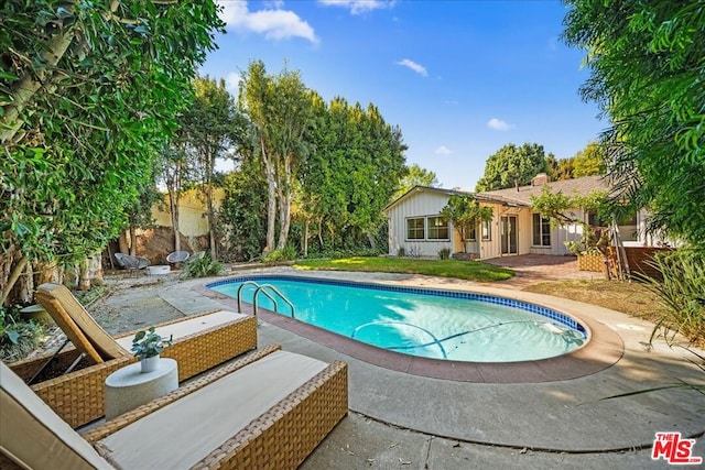 view of pool with a patio area