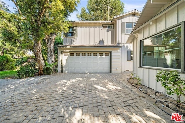 view of front of house with a garage