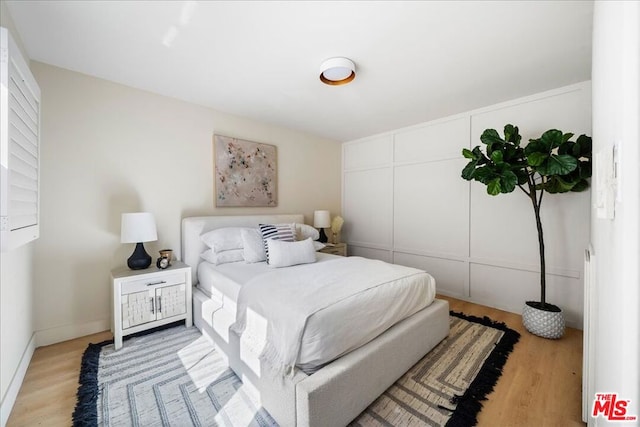 bedroom featuring light wood-type flooring