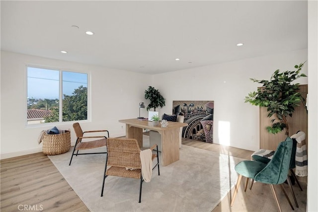 dining room with light hardwood / wood-style flooring