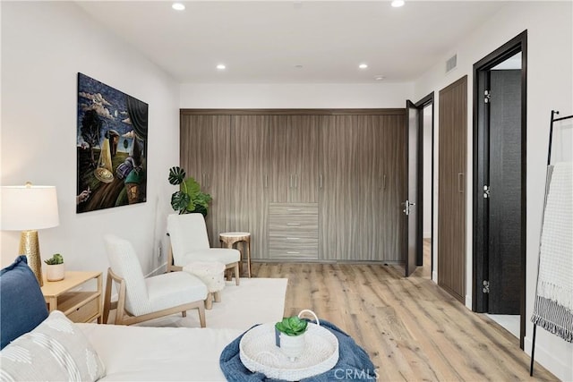 sitting room with light wood-type flooring