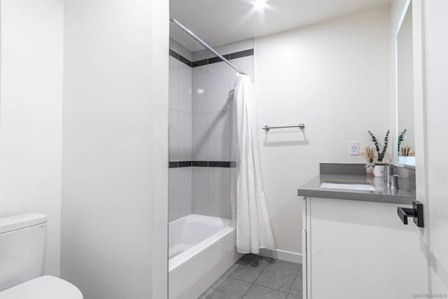 full bathroom featuring toilet, vanity, tile patterned floors, and shower / bathtub combination with curtain