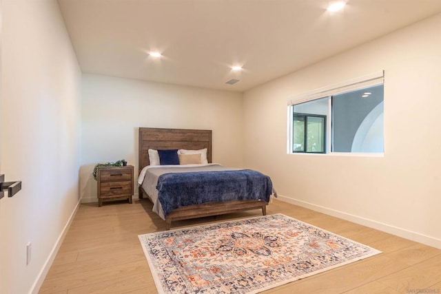 bedroom featuring light wood-type flooring