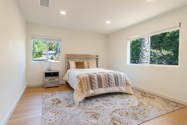 bedroom featuring light hardwood / wood-style flooring