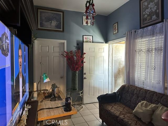 entrance foyer with light tile patterned floors