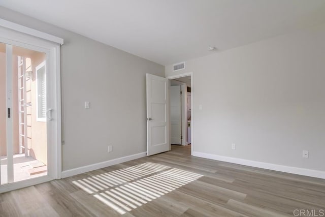 empty room featuring light hardwood / wood-style flooring