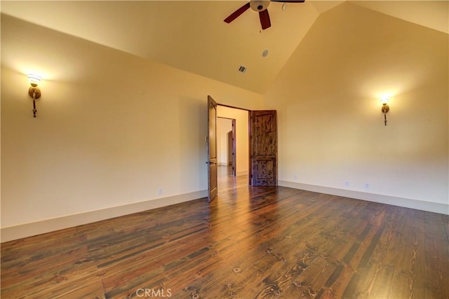 unfurnished room with ceiling fan, dark hardwood / wood-style flooring, and high vaulted ceiling