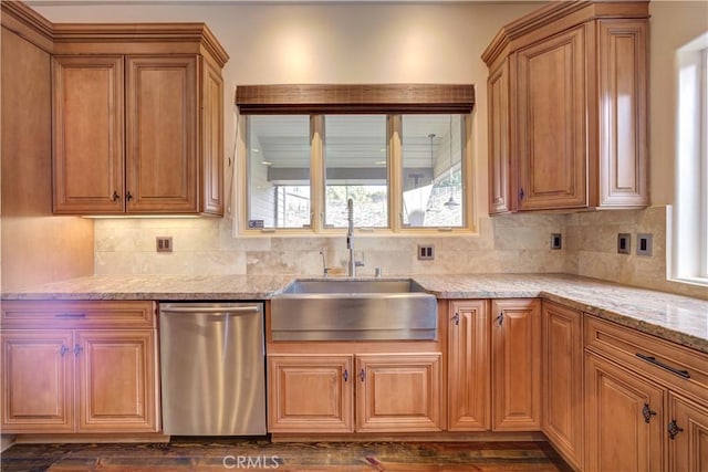 kitchen featuring dishwasher, dark hardwood / wood-style floors, and sink