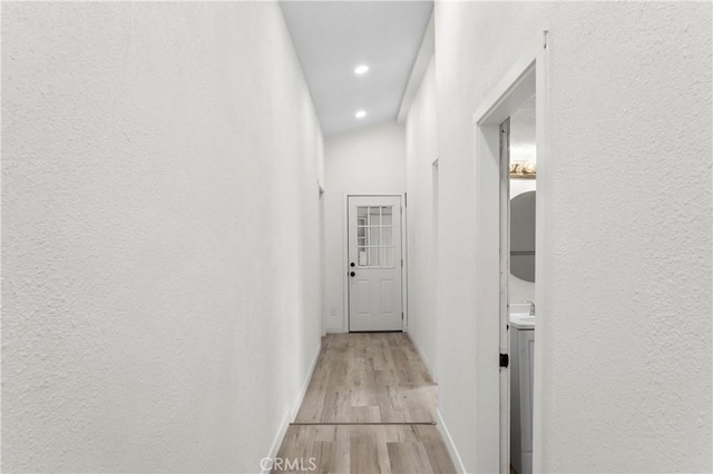 corridor featuring light wood-type flooring