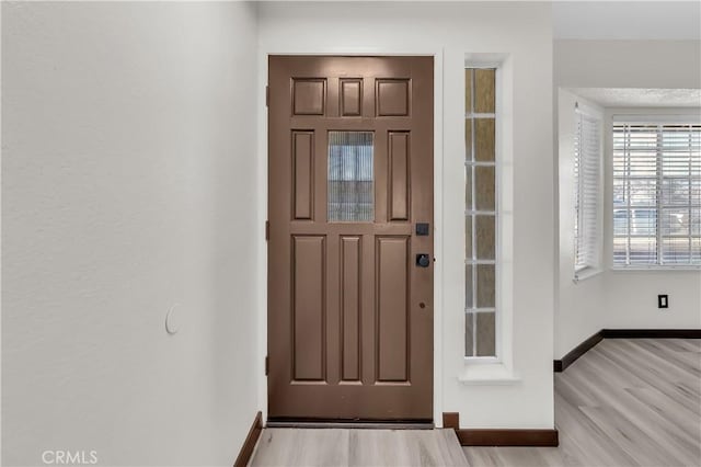 foyer featuring light hardwood / wood-style floors