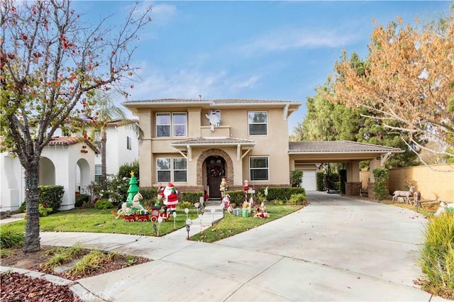 mediterranean / spanish house with a carport and a front lawn