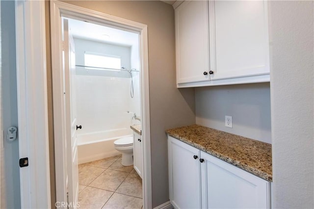 full bathroom with vanity, toilet, shower / bath combination, and tile patterned flooring