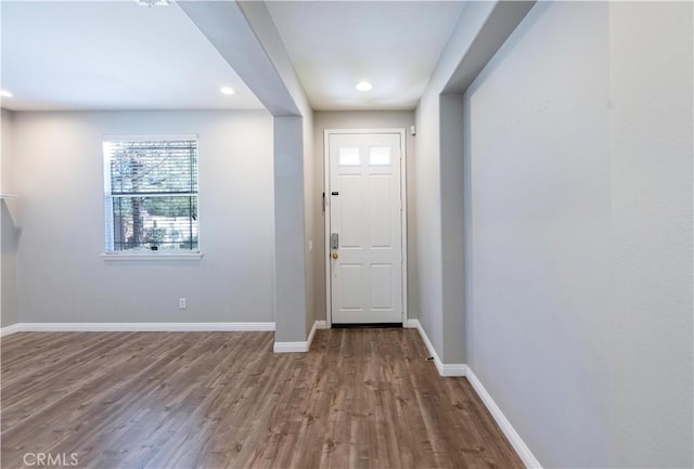 doorway with wood-type flooring