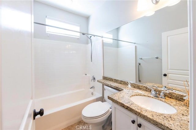 full bathroom with vanity, tile patterned floors, washtub / shower combination, and toilet