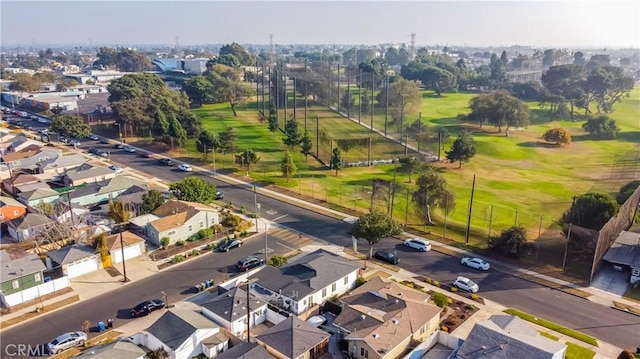 birds eye view of property with a residential view