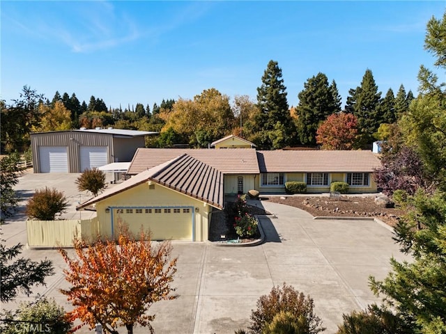 ranch-style house featuring a garage