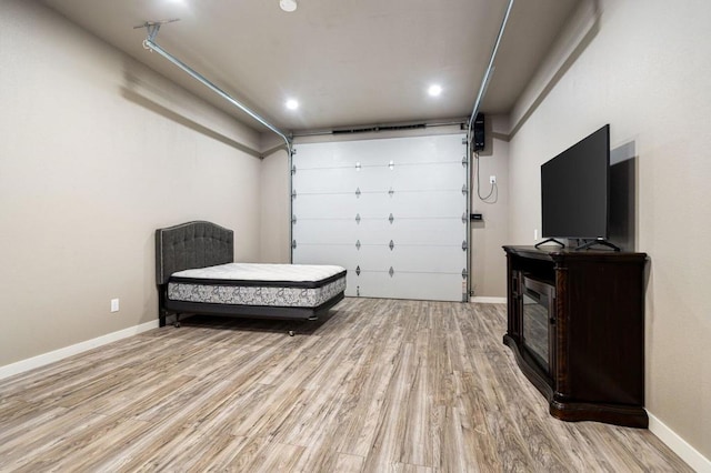 bedroom with light hardwood / wood-style floors