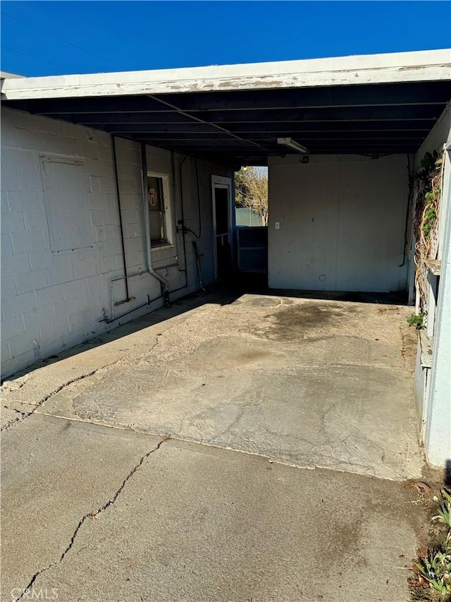 garage with a carport