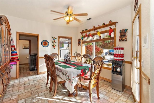 19985 Red Feather Rd, Apple Valley, CA 92307 - dining room with ceiling fan and light stone finish flooring