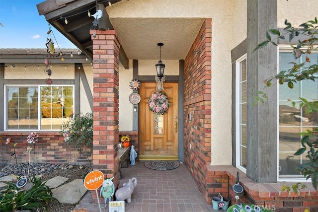 19985 Red Feather Rd, Apple Valley, CA 92307 - entrance to property featuring stucco siding and brick siding