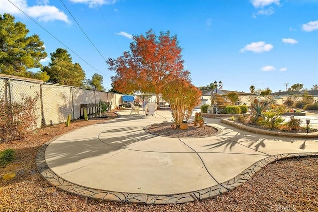 19985 Red Feather Rd, Apple Valley, CA 92307 - surrounding community with a patio area