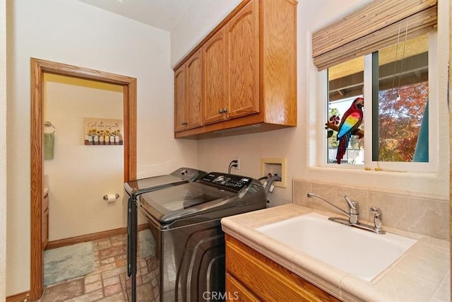 19985 Red Feather Rd, Apple Valley, CA 92307 - laundry area featuring cabinet space and washer and dryer