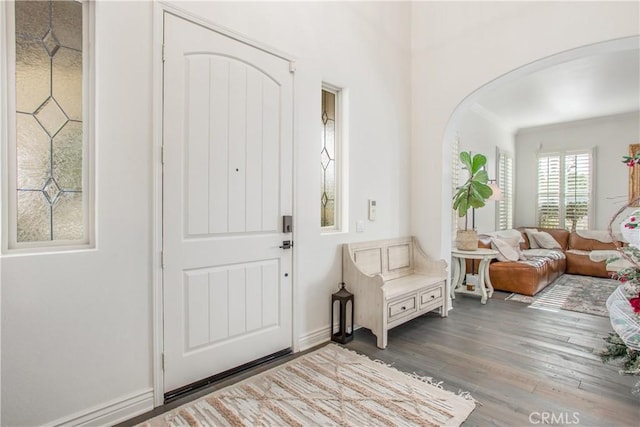 entryway with hardwood / wood-style flooring