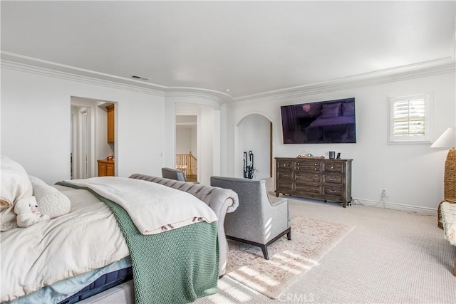 bedroom featuring light colored carpet and ornamental molding