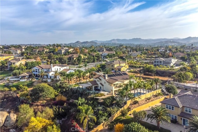 drone / aerial view featuring a mountain view