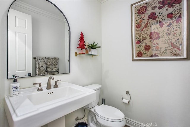 bathroom with toilet and sink