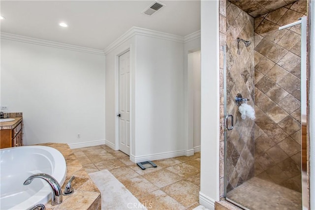 bathroom featuring crown molding, vanity, and independent shower and bath