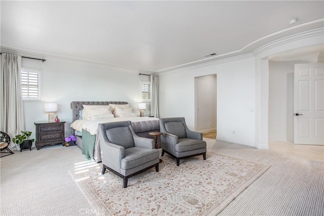 carpeted bedroom with crown molding