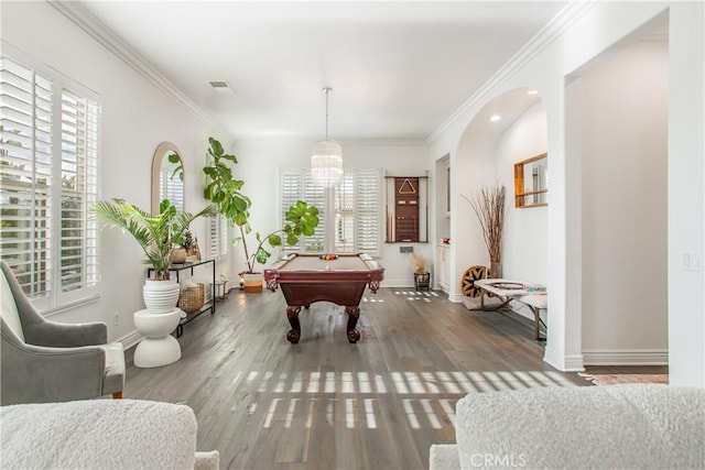 playroom featuring crown molding, dark hardwood / wood-style flooring, and pool table