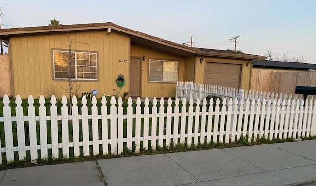 view of front of home with a garage