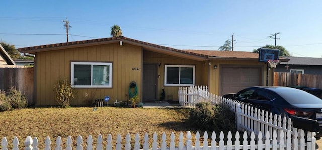 single story home with a garage