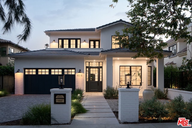 view of front of house with a garage