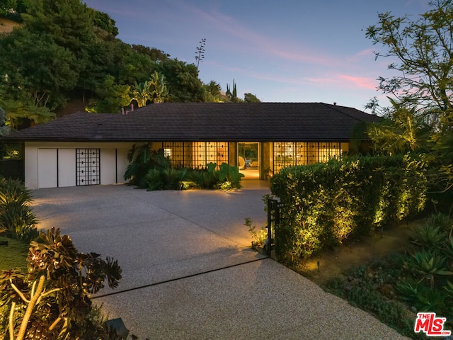 ranch-style home with a garage