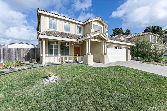 view of front of property featuring a garage, covered porch, and a front yard