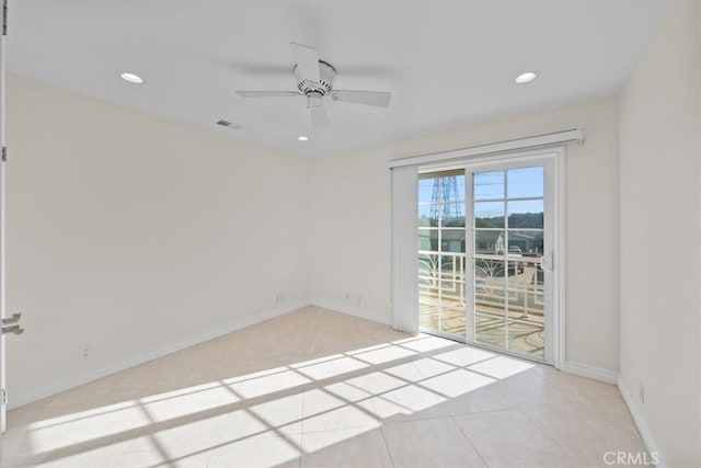 spare room featuring visible vents, recessed lighting, baseboards, and ceiling fan