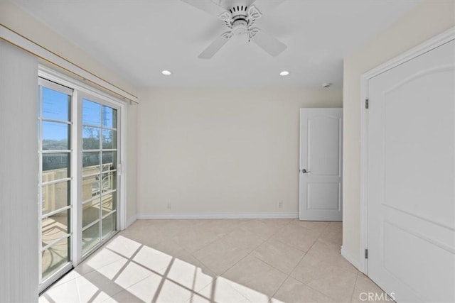 spare room with light tile patterned floors, recessed lighting, a ceiling fan, and baseboards