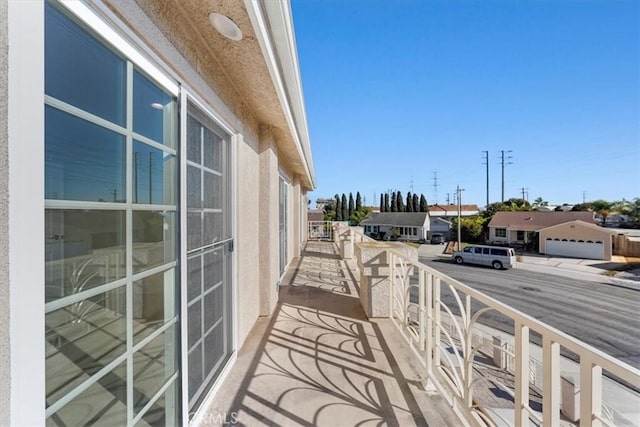 balcony featuring a residential view